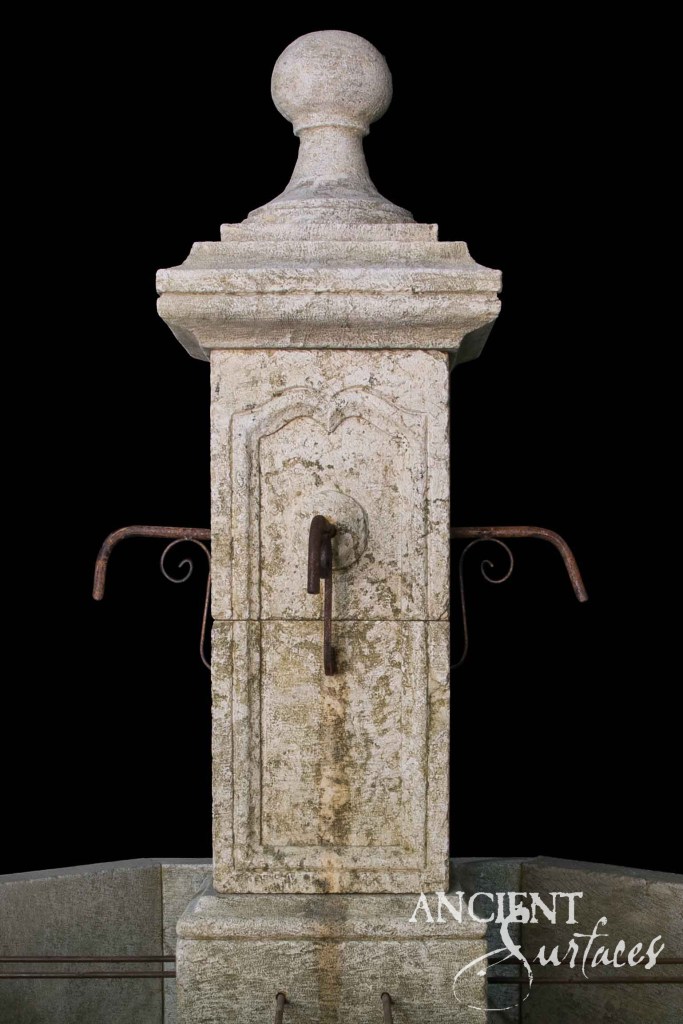 reclaimed limestone pool fountain
antique stone water feature
Ancient Surfaces fountain
limestone garden fountain
historic stone courtyard fountain
carved limestone basin
patinated limestone pool fountain
Mediterranean style stone fountain
architectural stone water feature
old-world limestone fountains
antique fountain
stone column fountain
reclaimed ancient limestone
timeless poolside water features
outdoor limestone fountain centerpiece